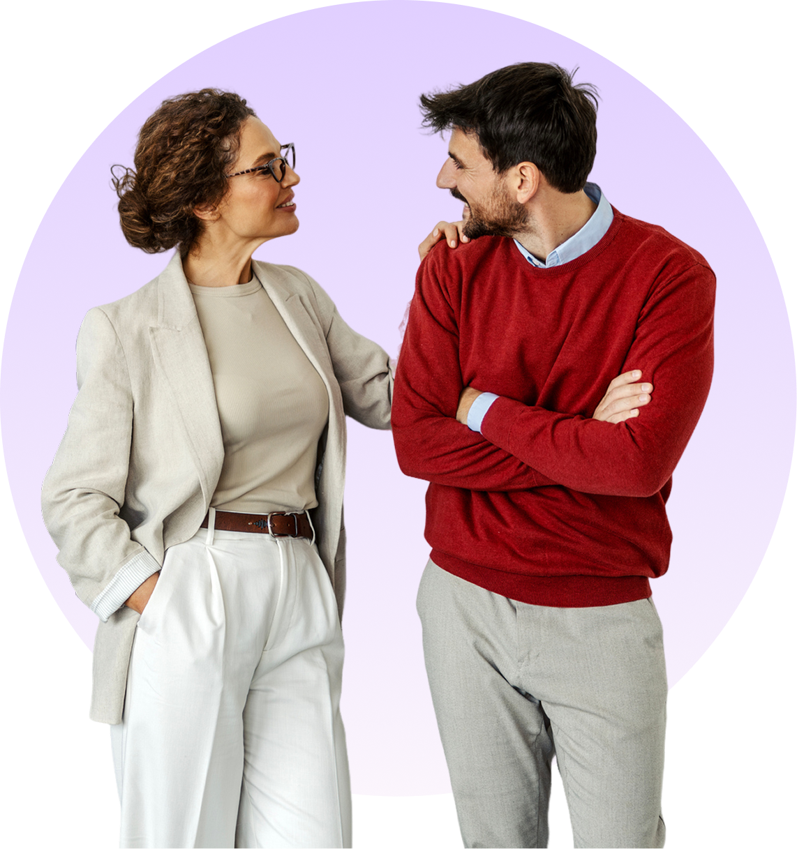 Two people smiling and looking at each other.