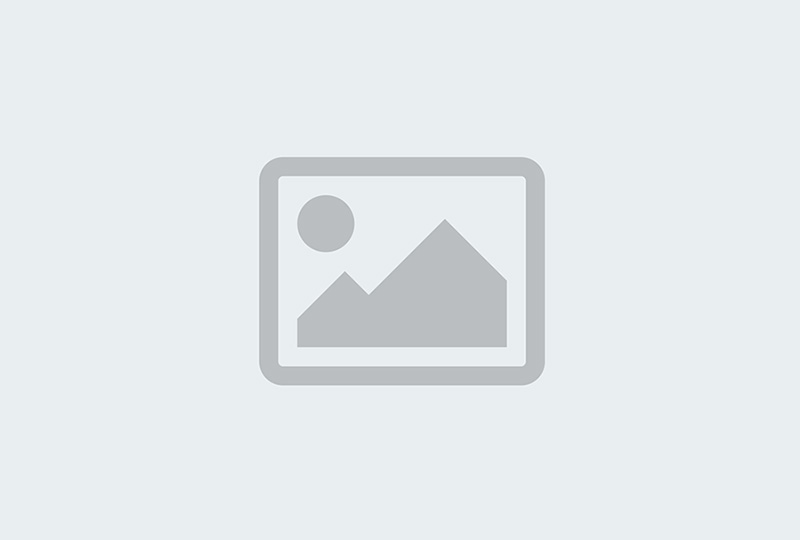 Placeholder image of mountains and sun.